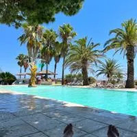 Mini-Villa Prestige - face à la Mer - Pieds dans l'eau - Resort 4 - Corse, hôtel à Ghisonaccia