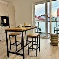 Nowo wybudowany Apartament w Centrum, Garaż Podziemny, Balkon, Winda, Wideodomofon, Wynajem na Doby, hotel v destinácii Białogard
