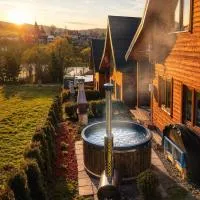 Osada Zawóz domki z balią jacuzzi i sauną nad Jeziorem Solińskim, отель в городе Завуз