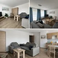 Pokoje i apartamenty Pod Dębem, hotelli kohteessa Rowy