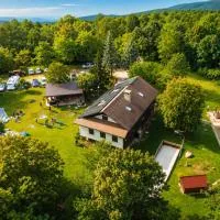 Koča sredi gozda, hotell sihtkohas Kanal