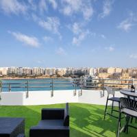 Seafront Penthouse paradise Views of Balluta Bay, hotell i Saint Julianʼs