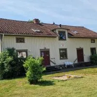 Sjötorps Säteris Bed & Breakfast Flygeln, hotel i Larv