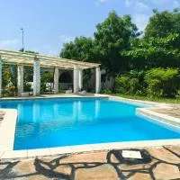 Fred Hunter Villa, hotel sa Tiwi