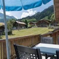 Alpine Chalet Apt near Interlaken Balcony&Parking, готель у місті Saxeten
