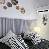 Amani Grand Cozy Stay Near Mactan Cebu Airport, hotel a prop de Aeroport internacional de Mact&aacute;n-Ceb&uacute;, a Mactan Cebu International