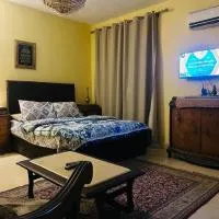 Pyramids Heritage suites, готель у місті Ghaţāţī