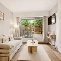 Charmant appartement en rez-de-jardin à Cabourg, hotel em Cabourg