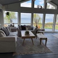 Sj&oslash;hytte med jacuzzi, sauna og panoramautsikt, hotel in zona Aeroporto di Harstad/Narvik, Narvik