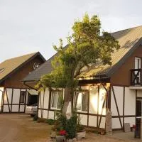 Cztery Wiatry Jezierzany koło Jarosławca domki i pokoje nad Jeziorem Wicko, hotel Jarosławiecben
