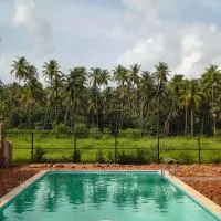 La Petite Boutique Hotel with Pool Near Beach and Airport, hotel em Bogmalo