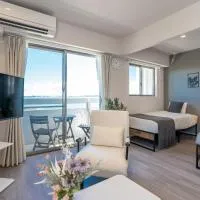 Crest Blue 404-オーシャンフロント! 新築マンション!, hotel en Kin