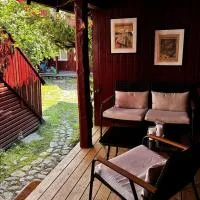 Sommerfuglen - sjarmerende idyll midt i Gamlebyen، فندق في فريدريكستاد