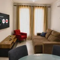 Casa Jack&Mari c ar-condicionado, Wi-Fi e churrasqueira, 600m da praia, 2 quartos sendo 1suíte, até 8 pessoas, Hotel in Itapoa