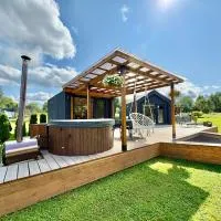 Lejasciems में, होटल Rātes Krasti - PĒRLE- holiday house with sauna and lakeview