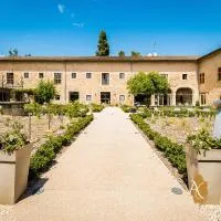 Viesnīca Demeures et Châteaux l'Abbaye Caladoise pilsētā Vilfranša pie Sonas