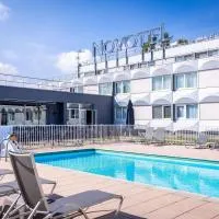 Novotel Mulhouse Bâle Fribourg, hotel en Sausheim