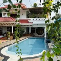 Parudeesa - Luxurious Palace look with pool-Near CBD - Kerala - India with Breakfast, hotel em Kāladi