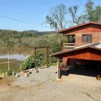 Casa rústica às margens do lago, hotel i Maximiliano de Almeida