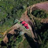 Pousada Pedra da Mata chalés na montanha, hótel í Munhoz