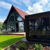 Leszcz1321- Dom z linią brzegową, sauna, jacuzzi, hotel in Leszcz