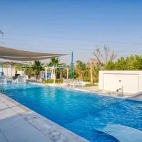 2 bedrooms Private Villa 40 Meters Pool and BBQ, отель в Рас-эль-Хайме