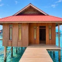 Aisyah Homestay, Pulau Papan, Togean, отель в городе Pulau Malingi