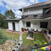 Ferienwohnung Wölf, хотел в Eiterfeld