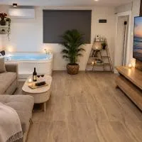 לב המעיין- סוויטה מושלמת עם ג'קוזי פנימי וחיצוני במושב פסטורלי, hotel en Reẖov