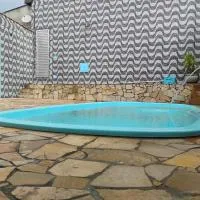 Casa com piscina, hotel en Mairiporã