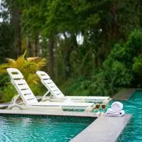 Clover Holiday Village Coorg Resort by VOYE HOMES، فندق في Sanivārsante