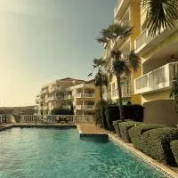 Modern appartement bij zee met zwembad op Blue Bay - Tripletree the hill, hotel din Sint Michiel