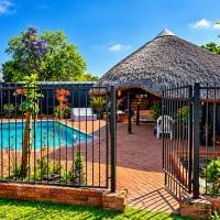 Viesnīca Modern Getaway Near City, The Perfect Stay Awaits pilsētā Pretorija