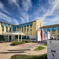 Munich Airport Marriott Hotel, хотел в Фрайзинг