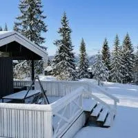 Cozy mountain lodge in Trysil - Ski-bike-in-out، فندق في تريسيل