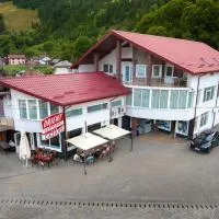 Pensiunea. ORIENT, khách sạn ở Frumosu