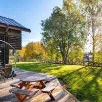 Cozy Log House - Gränsfors 354、Bergsjöのホテル