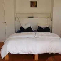 Zimmer am Ring - ruhiges Zimmer im Grünen, Frühstück auf eigener Terrasse mit Morgensonne und fußläufig zum Badeplatz Schwarzindien am Mondsee, hotel di Sankt Lorenz