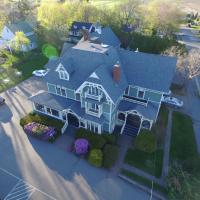 an overhead view of a large blue house at Victoria's Historic Inn, Wolfville