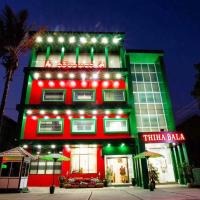 Thiha Bala Hotel, готель у місті П'їнулуін