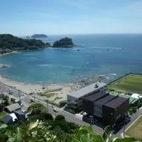 Sunset Breeze Hota, hotell i Kyonan