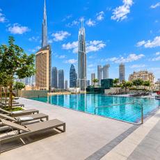 Vogue Vacation Homes, Downtown Views II with Easy Access to Dubai Mall Via a Climate Controlled Bridge, One Bedroom Apartment with Balcony and City View