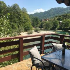 Cozy house next to river Neretva in nature