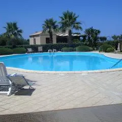 Casa Vacanze Libeccio - Villetta con giardino e piscina condominiale