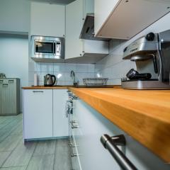 Wrzosowy apartament z darmowym parkingiem, 290m od Świętojańskiej