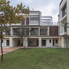 StayVista's Greenwoods Villa 9 - City-Center Villa with Private Pool, Terrace, Lift & Ping-Pong Table