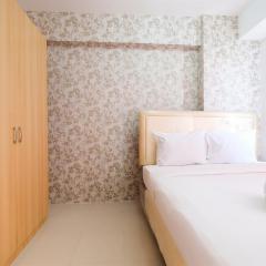 Cozy 2BR Bassura City Apartment with City View By Travelio