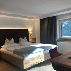 Hotel Garni Central - Zimmer - Studios - Apartments