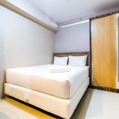 Classic 2BR Bassura City Apartment By Travelio