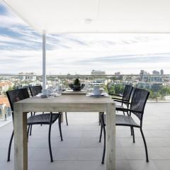 Minimalist Penthouse Condo with Skyline Vistas